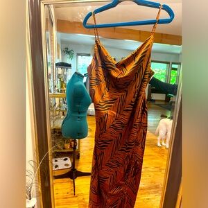 Miss Lola brown and black animal print sexy dress.